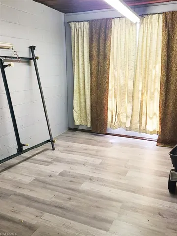 Empty room featuring  light wood-style floors