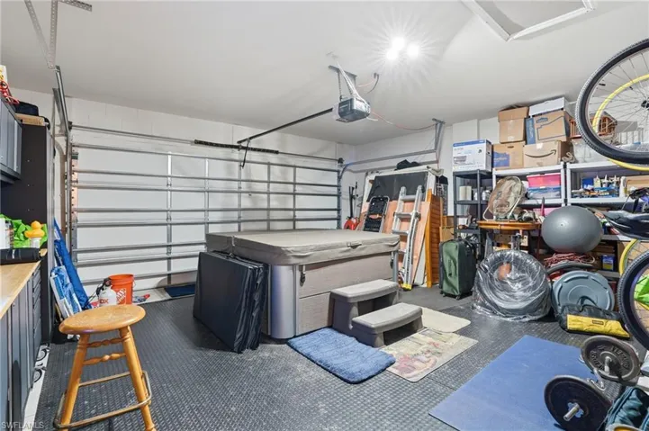 Garage featuring a garage door opener