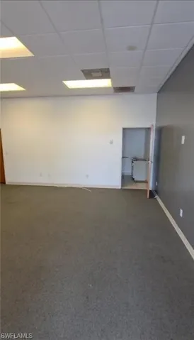 Unfurnished room featuring a paneled ceiling