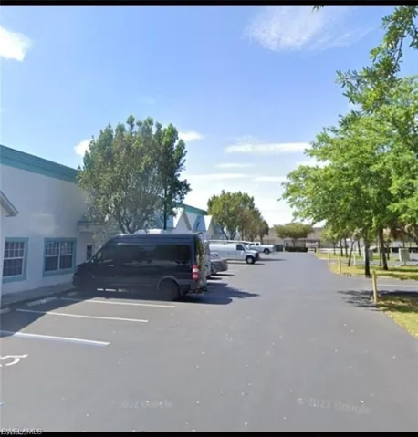 View of uncovered parking lot