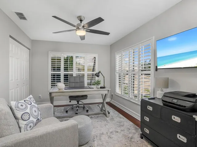 Office area and or den, with hardwood flooring - Staged