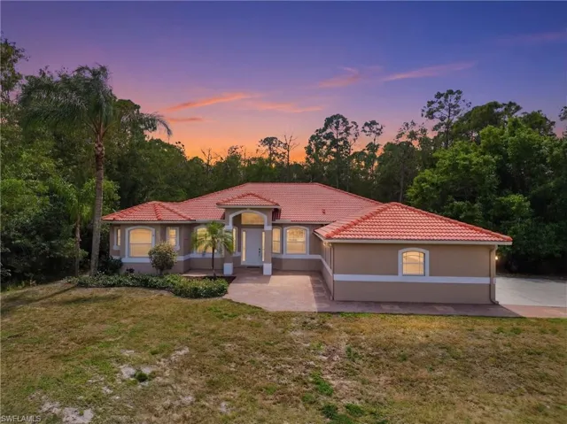 Virtually enhanced twilight photo front of house