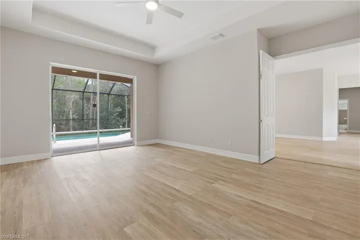 Primary Bedroom with Sliders to pool, lanaiFrench doors entering into Primary Bedroom