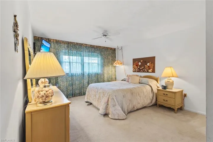 Bedroom with carpet floors and ceiling fan