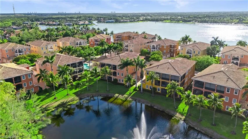 Aerial view with a water view and a residential view
