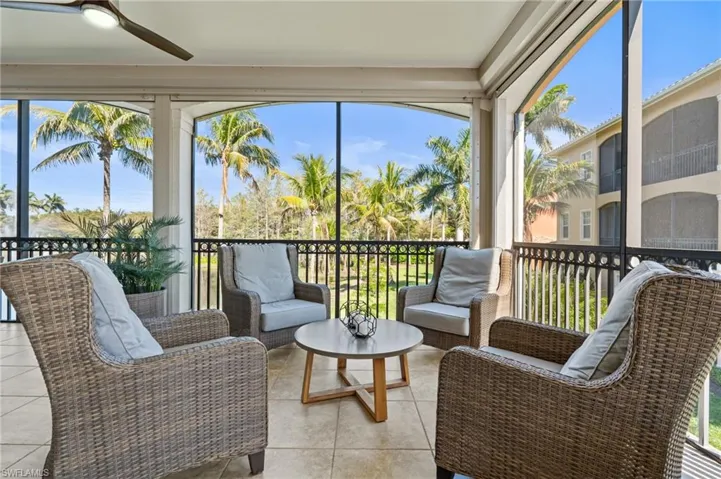 Sunroom / solarium featuring an outdoor living space and ceiling fan