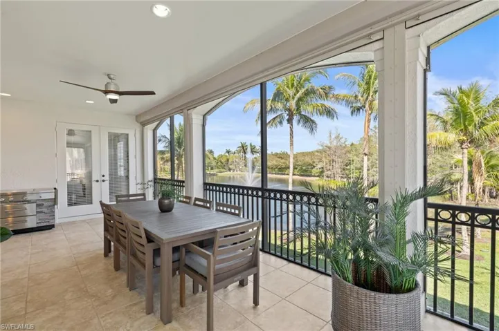 Sunroom with recessed lighting, french doors, and a healthy amount of sunlight