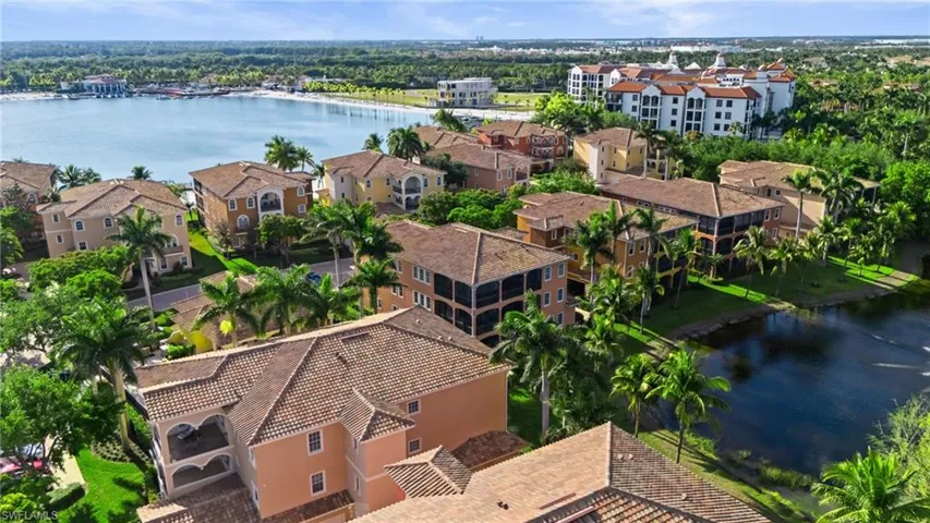 Aerial view with a residential view and a water view