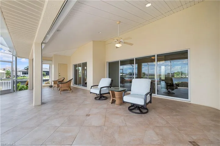 View of patio with ceiling fan