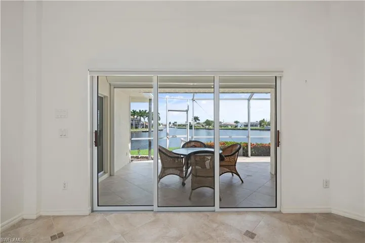 Doorway to outside with a water view