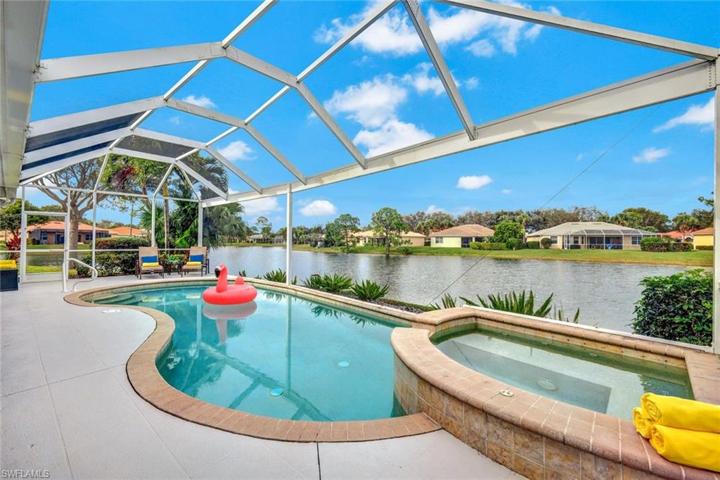 Welcome to Paradise!  Pool, spa and long lake view!