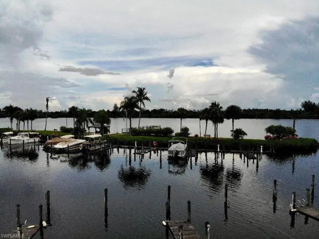 Water view with a boat dock