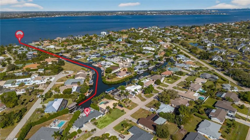 Aerial overview of property's location with nearby suburban area