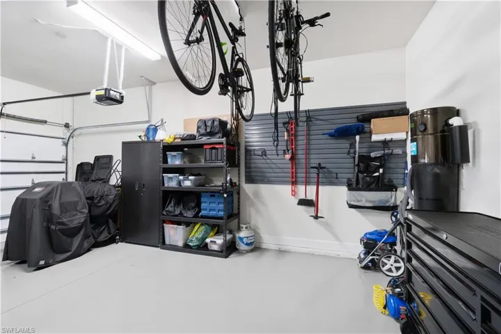 Garage featuring a garage door opener