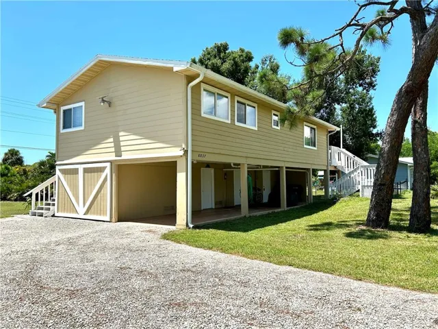 Large driveway plus 2 position car port