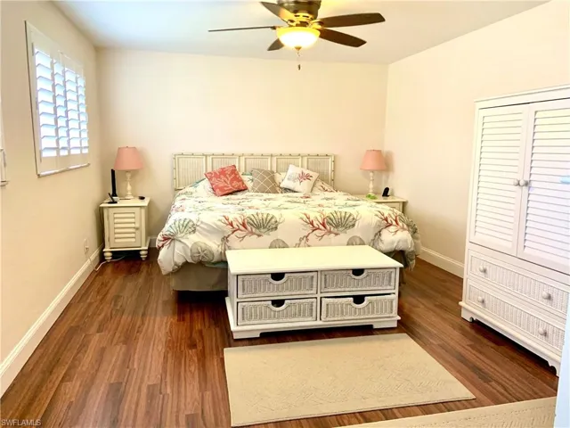 Large master bedroom with ceiling fan