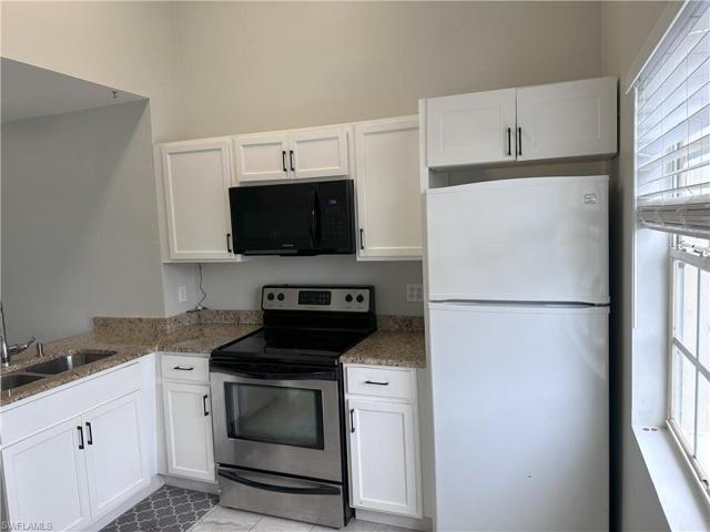 Kitchen looking into dining area.