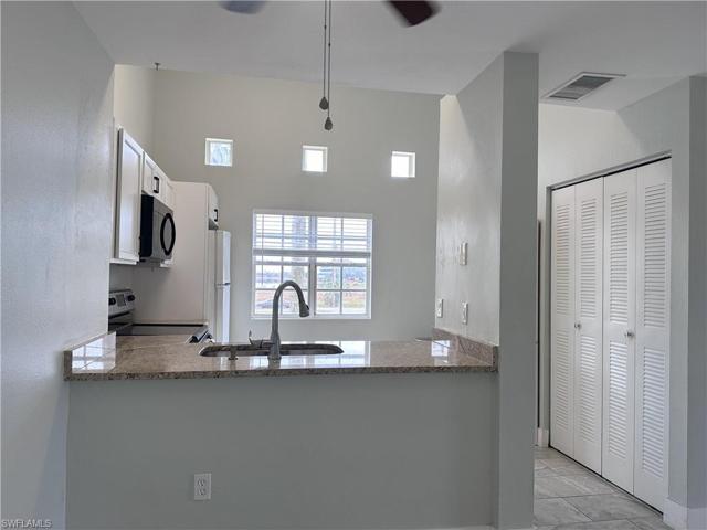 Looking into kitchen.