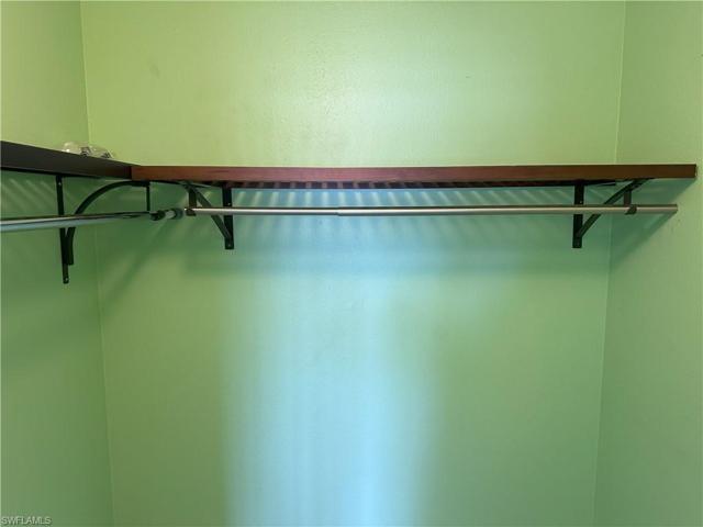 Primary Bedroom walk in closet.