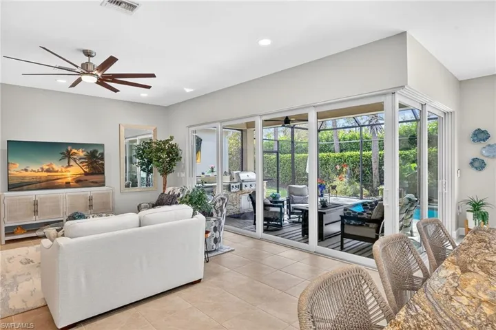 ZERO CORNER SLIDER DOORS captured here! Plus a glimpse of the super high end outdoor kitchen with side burner and fridge!