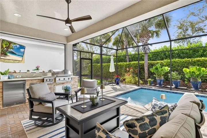 Motorized screens on rear of home means you don't have to bring outdoor furniture inside!