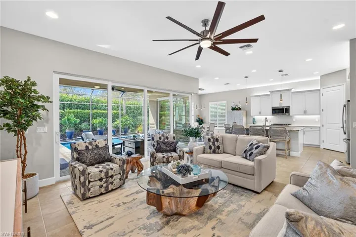 SEE IT??? The zero corner sliding doors wrap around from the great room to the dining room and when opened provide an extra outdoor room for your year round use in paradise!!!