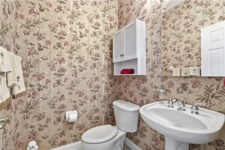 Powder room, off the foyer.