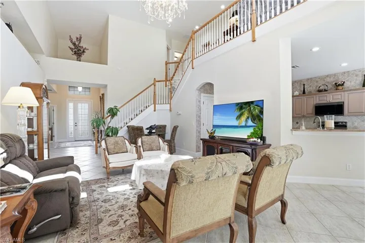 Bright and open great room with vaulted ceiling.