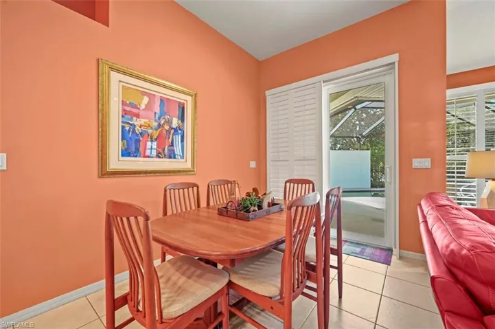 Dining area featuring plenty of natural light and light tile patterned floors