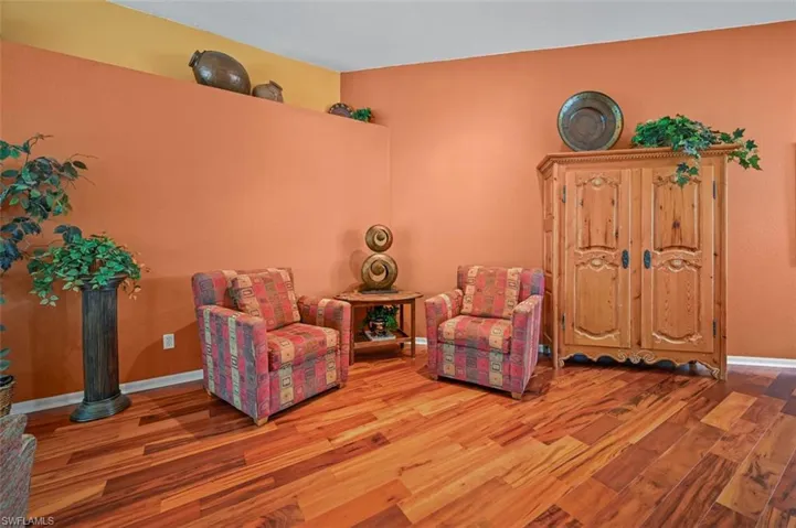 Living area featuring wood-type flooring