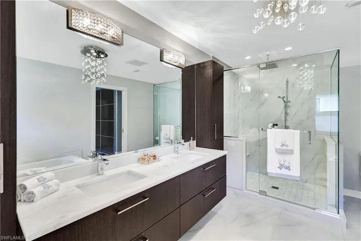 Primary Bathroom with a shower glass enclosure