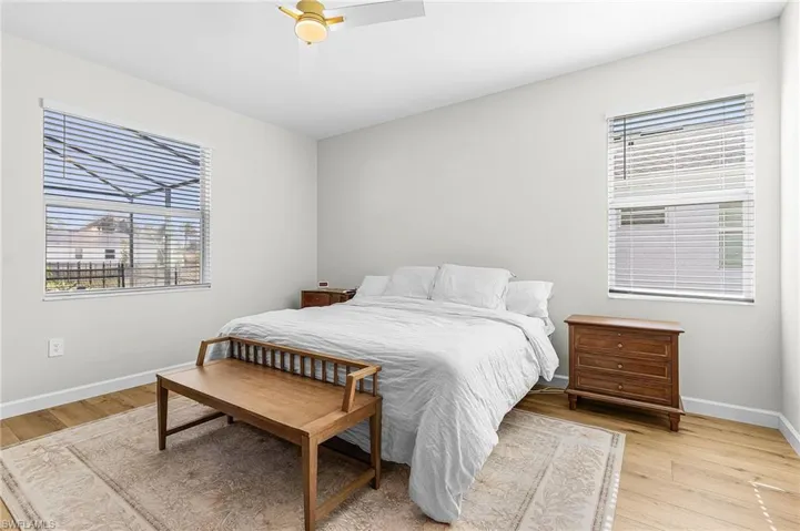 Bedroom featuring ceiling fan and light wood finished floors