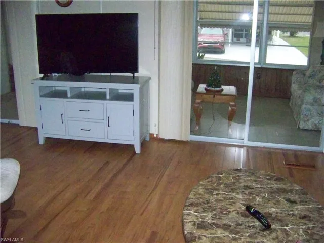 2 sets of sliders to Florida room