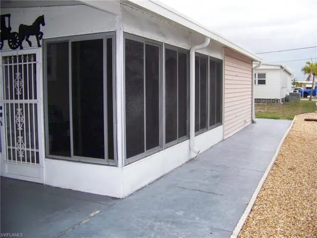 All weather lanai & nice concrete walkway to shed & exterior laundry room door