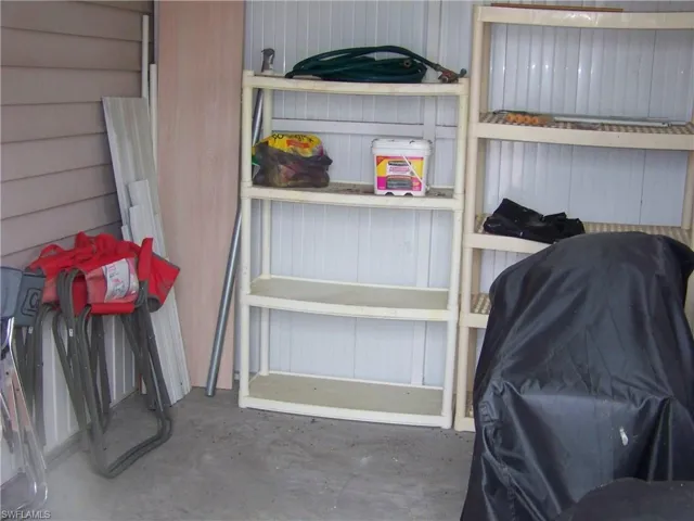 Inside the double door shed. Much more room than picture shows.