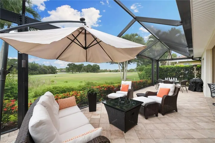 View of patio with an outdoor hangout area
