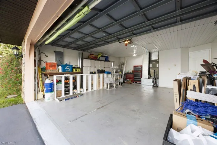 Garage with electric panel and heating unit