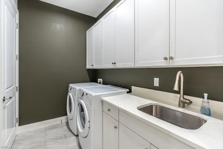 laundry room washer and dryer and utility tub