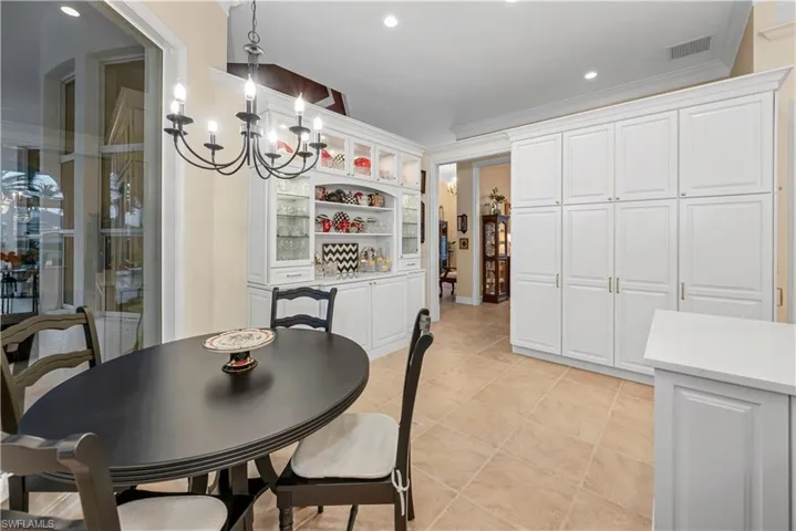 kitchen pantry area with pull out drawers