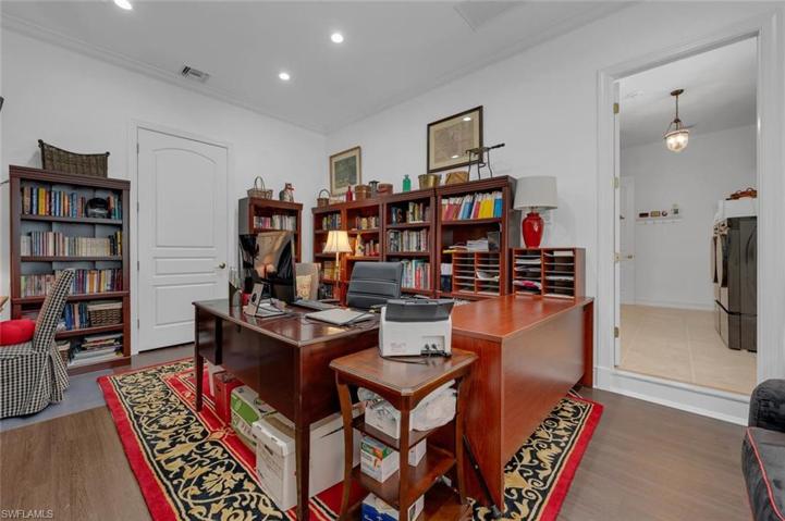 Office with custom storage / can be 3rd bay garage