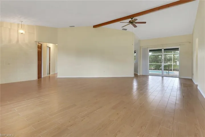 Unfurnished room with light wood-style flooring and a ceiling fan