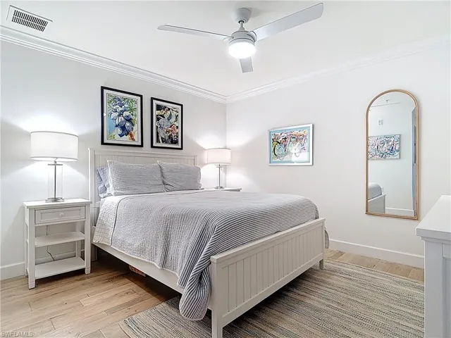 GUEST BEDROOM W LIGHT FLOORING