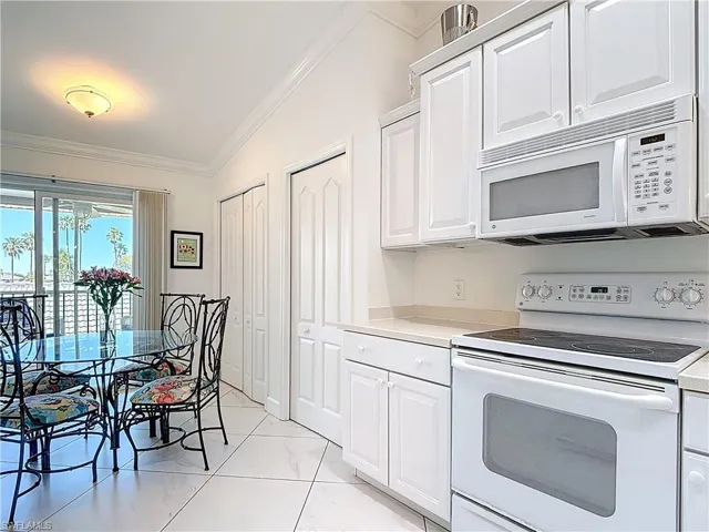 VIEW OF BREAKFAST NOOK, LARGE TILE BOTH LANAIS AND LIVING AREA