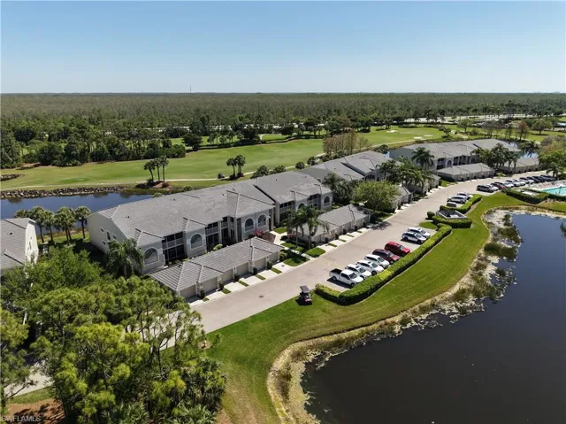 AERIAL PHOTO OF BUILDING AND LAKE