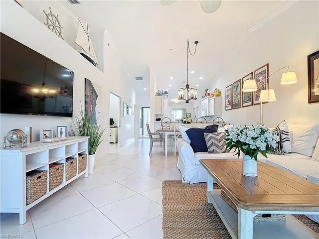 BRIGHT AND COSSY LIVING ROOM, DINING AND VIEW OF FRONT DOOR