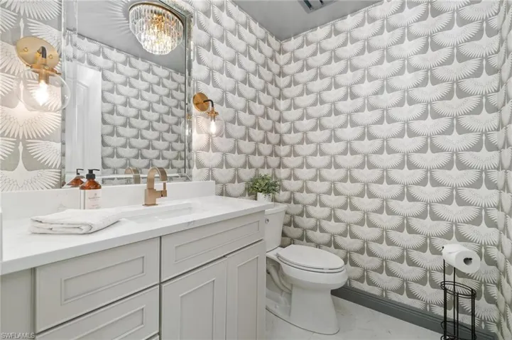 Bathroom with vanity and toilet