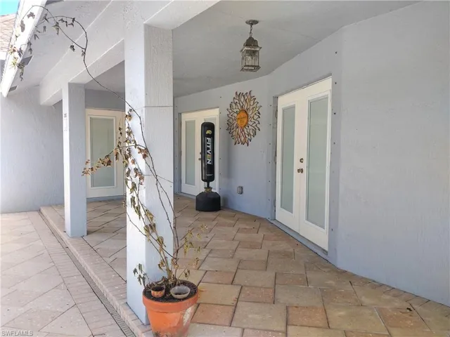 Back Lanai featuring french doors to Living Room, Master and Sitting Room