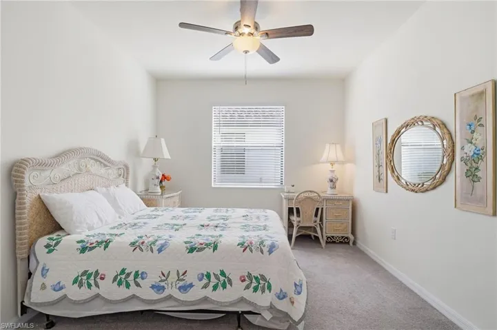 Den set up as a 4th bedroom with queen sized bed