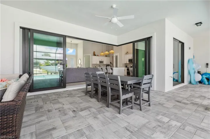 Dining area with ceiling fan