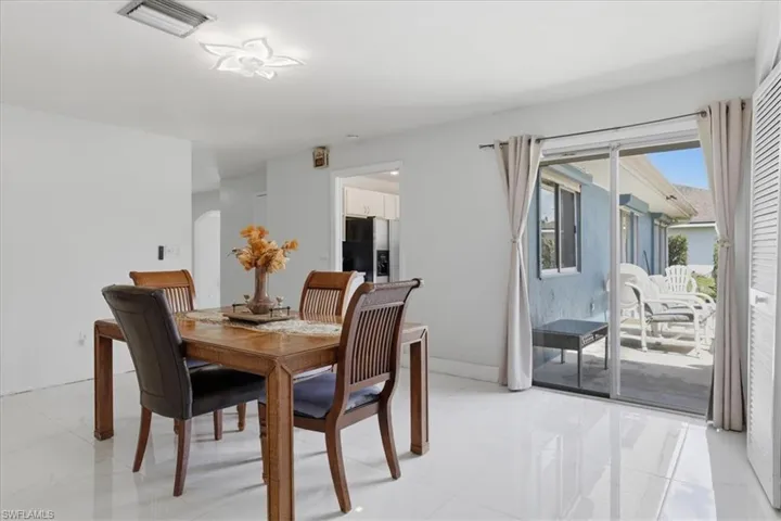 Dining area featuring arched walkways